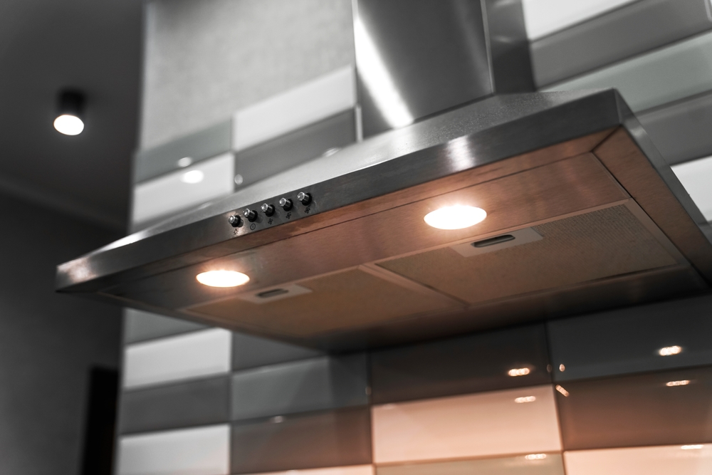 Kitchen,Metal,Hood,With,Illumination,Close-up.,Extractor,Hood,In,The